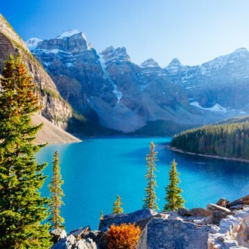 Moraine Lake is a glacially-fed lake in Banff National Park 14 km outside of Lake Louise, Alberta, Canada. It is situated in the Valley of the Ten Peaks, at an elevation of approximately 1885 m.