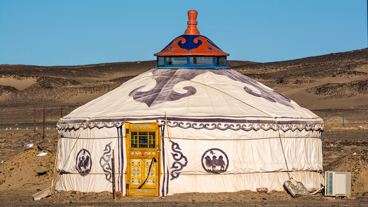 Ejina Qi,Inner Mongolia,China-October 14,2013 : View of Gobi desert with Mongolian Yurt in Ejina Qi,Inner Mongolia,China.